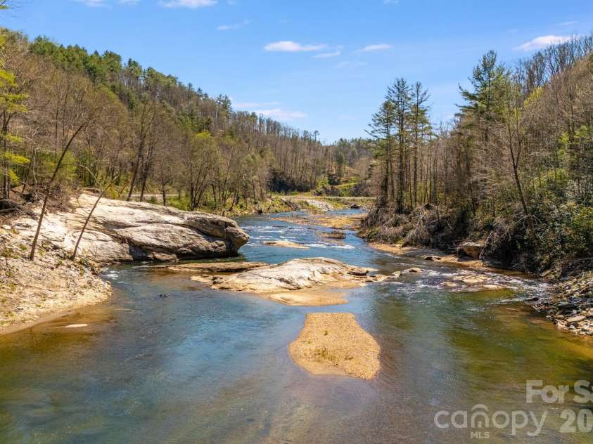 4530 Double Island Road, Green Mountain, NC 28740.  MLS# CAR4362589, YatesRealty ID 17388. Access to the North Toe River