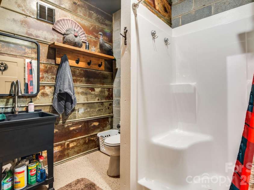 4530 Double Island Road, Green Mountain, NC 28740.  MLS# CAR4362589, YatesRealty ID 17388. Basement full bathroom