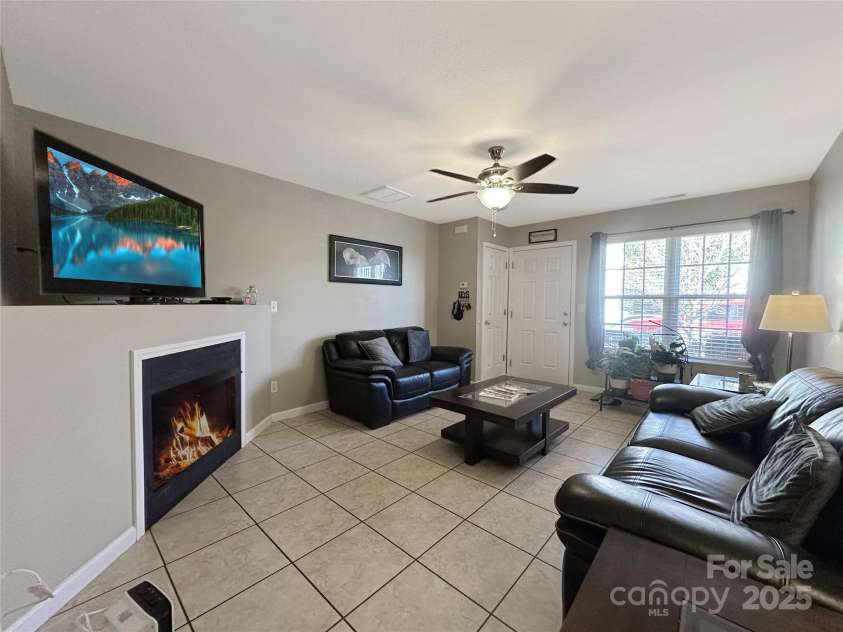 226 Farington Circle, Fletcher, NC 28732.  MLS# CAR4217027, YatesRealty ID 1739. Cozy Living Room
