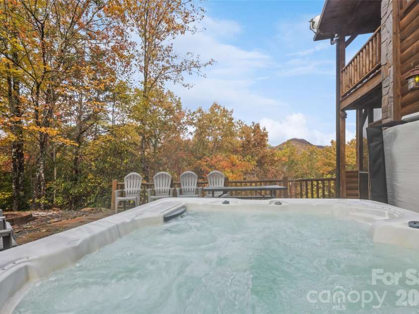 235 Soaring Eagle Road, Bryson City, NC 28713.  MLS# CAR4316418, YatesRealty ID 1739. Hot tub included with views of the Smokies