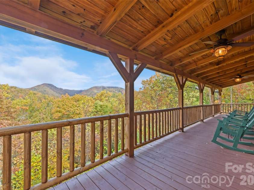 235 Soaring Eagle Road, Bryson City, NC 28713.  MLS# CAR4316418, YatesRealty ID 1739. Upper porch with epic views of the Great Smoky Mountains National Park 