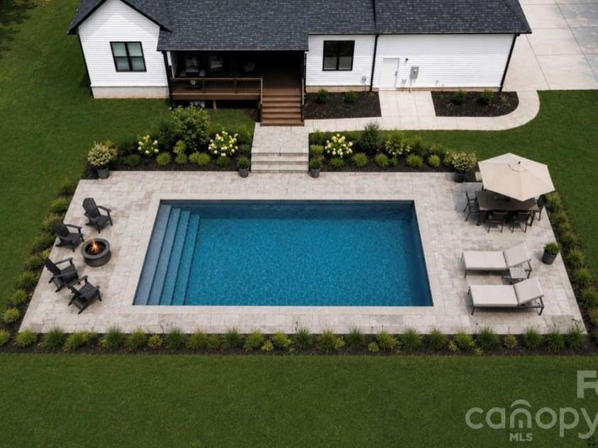 511 Fowler Road, Monroe, NC 28110.  MLS# CAR4376569, YatesRealty ID 17398. AI Rendering.