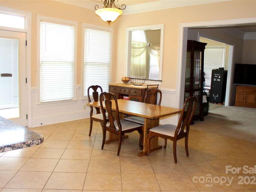 8620 Rolling Fields Road, Charlotte, NC 28227.  MLS# CAR4266446, YatesRealty ID 17398. Primary Bedroom with En-Suite and Custom Walk-in Closet.