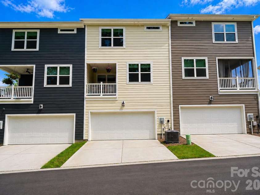 12008 John Newton Drive, Davidson, NC 28036.  MLS# CAR4375341, YatesRealty ID 17400. Back of Home