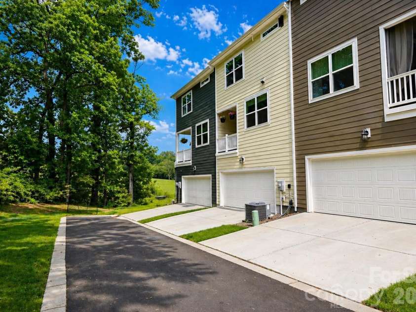 12008 John Newton Drive, Davidson, NC 28036.  MLS# CAR4375341, YatesRealty ID 17400. Street View Back