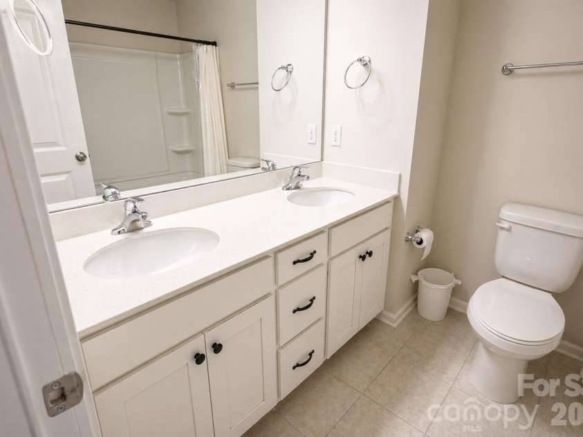 12008 John Newton Drive, Davidson, NC 28036.  MLS# CAR4375341, YatesRealty ID 17400. Upper Guest Bedroom 2