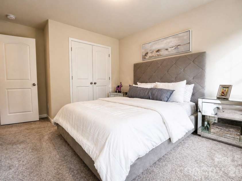 12008 John Newton Drive, Davidson, NC 28036.  MLS# CAR4375341, YatesRealty ID 17400. Upper Guest Bedroom