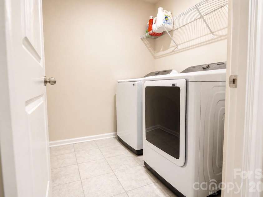 12008 John Newton Drive, Davidson, NC 28036.  MLS# CAR4375341, YatesRealty ID 17400. Upper Laundry