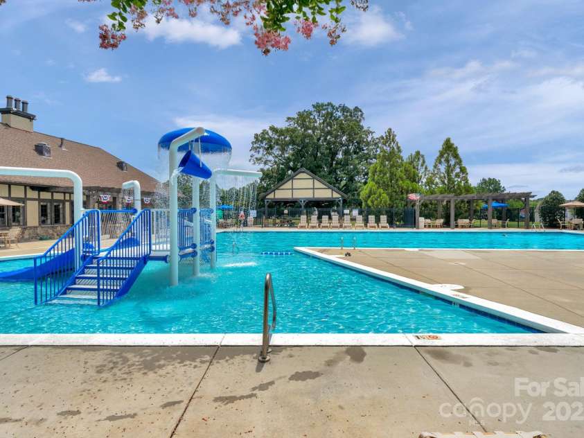 2711 Liberty Hall Court, Waxhaw, NC 28173.  MLS# CAR4228548, YatesRealty ID 17401. Another is the community pool, complete with an active swim team.