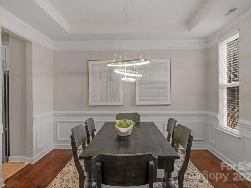 2711 Liberty Hall Court, Waxhaw, NC 28173.  MLS# CAR4228548, YatesRealty ID 17401. Large dining room adjacent to the kitchen