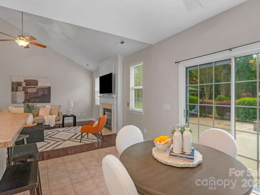 2711 Liberty Hall Court, Waxhaw, NC 28173.  MLS# CAR4228548, YatesRealty ID 17401. Sliding glass doors lead to a giant patio and peaceful back yard.