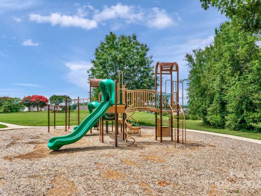 2711 Liberty Hall Court, Waxhaw, NC 28173.  MLS# CAR4228548, YatesRealty ID 17401. The playground is just one of the amenities you'll enjoy while living here.