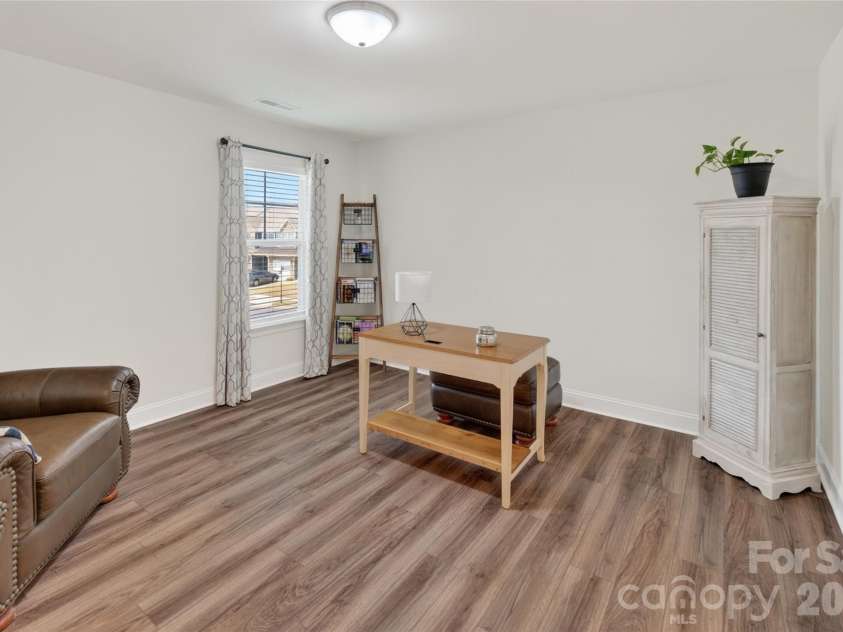 3881 Center Place Drive, Harrisburg, NC 28075.  MLS# CAR4372503, YatesRealty ID 17403. Bedroom with shared bathroom