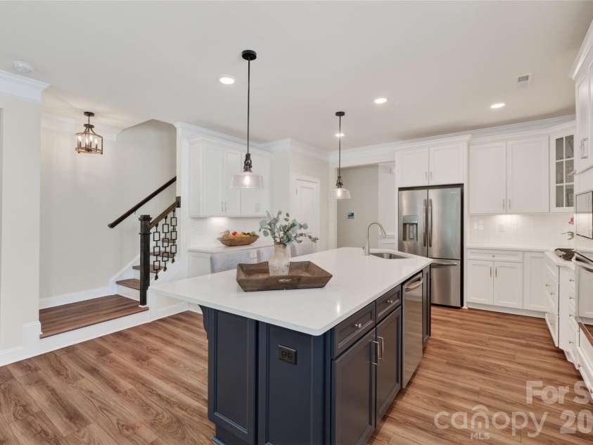 3881 Center Place Drive, Harrisburg, NC 28075.  MLS# CAR4372503, YatesRealty ID 17403. Cabinets feature lighting