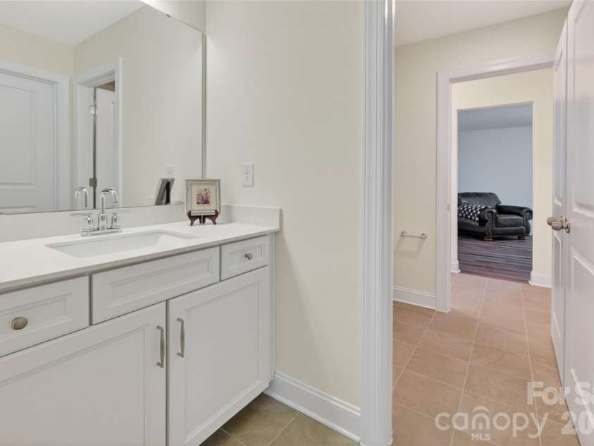3881 Center Place Drive, Harrisburg, NC 28075.  MLS# CAR4372503, YatesRealty ID 17403. Shared bathroom with private sink 