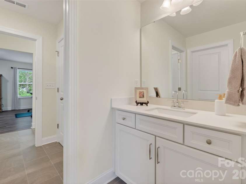 3881 Center Place Drive, Harrisburg, NC 28075.  MLS# CAR4372503, YatesRealty ID 17403. Shared bathroom with private sink