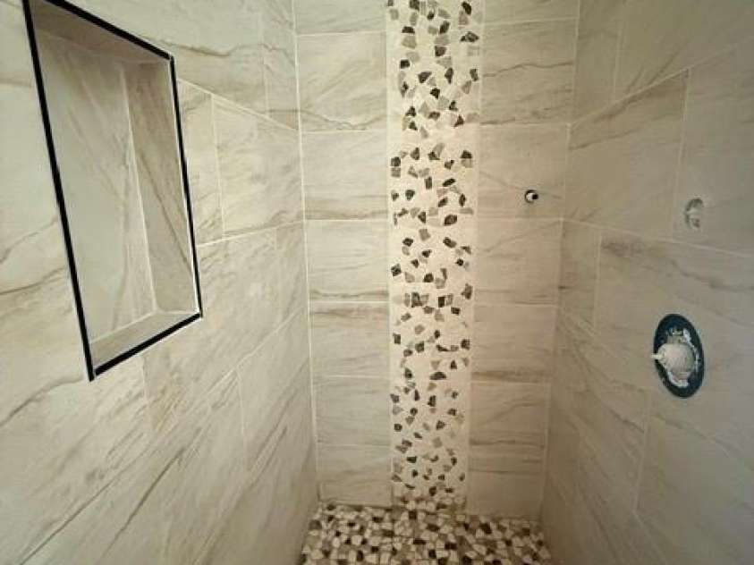 3 Locust Street, Asheville, NC 28804.  MLS# CAR4376669, YatesRealty ID 17410. Custom Walk in tile shower 