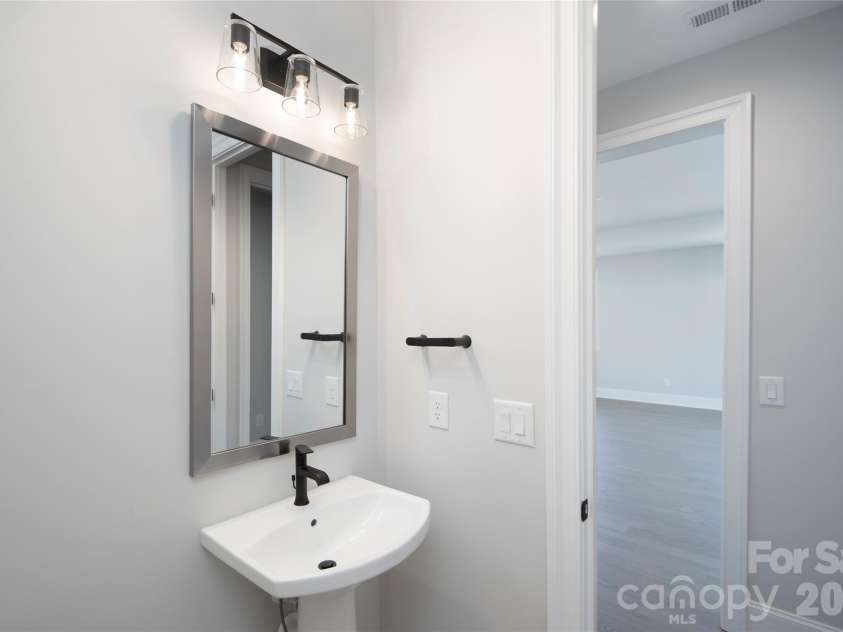 1003 Detweiler Road, Marvin, NC 28173.  MLS# CAR4376899, YatesRealty ID 17411. Powder room upstairs