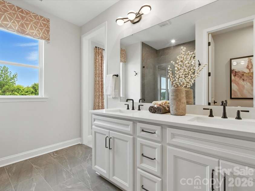 513 Nash Street, Fort Mill, SC 29715.  MLS# CAR4376919, YatesRealty ID 17414. Dual vanity primary