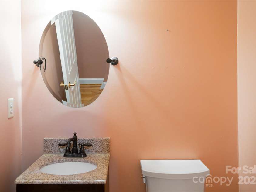 8 Scarlet Rdg Lane, Weaverville, NC 28787.  MLS# CAR4233209, YatesRealty ID 17414. Convenient Half Bath for guests