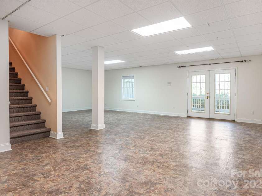 8 Scarlet Rdg Lane, Weaverville, NC 28787.  MLS# CAR4233209, YatesRealty ID 17414. Finished daylight basement