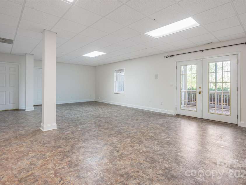 8 Scarlet Rdg Lane, Weaverville, NC 28787.  MLS# CAR4233209, YatesRealty ID 17414. Incredible heated and cooled space for office, in-law, hobbies, etc