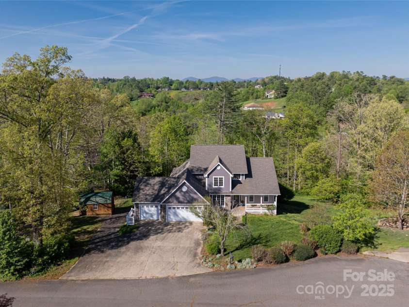 8 Scarlet Rdg Lane, Weaverville, NC 28787.  MLS# CAR4233209, YatesRealty ID 17414. Mature landscaping in rural setting