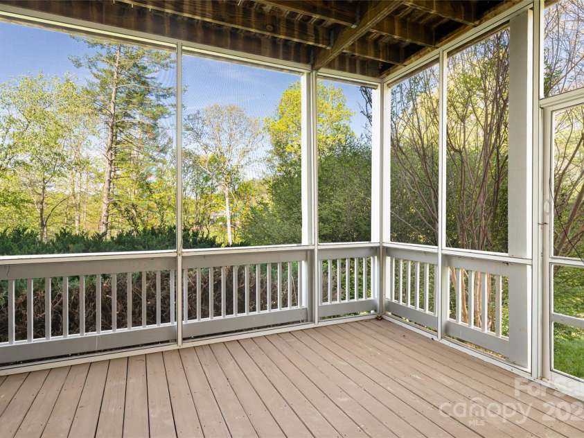 8 Scarlet Rdg Lane, Weaverville, NC 28787.  MLS# CAR4233209, YatesRealty ID 17414. Screened-in porch with pastoral views
