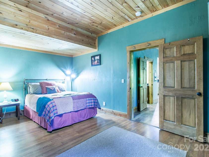 58 Great Aspen Way, Black Mountain, NC 28711.  MLS# CAR4256095, YatesRealty ID 17415. Another look at the downstairs apartment bedroom.