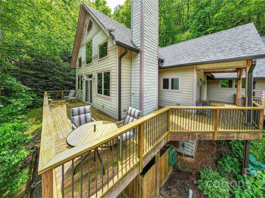 58 Great Aspen Way, Black Mountain, NC 28711.  MLS# CAR4256095, YatesRealty ID 17415. Large entertainment deck is perfect for relaxing while enjoying the views with family and friends. 