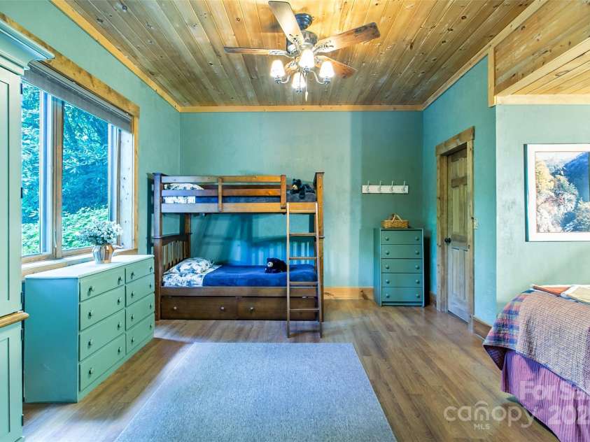 58 Great Aspen Way, Black Mountain, NC 28711.  MLS# CAR4256095, YatesRealty ID 17415. Looking into the downstairs apartment bedroom. Plenty of room for furniture.