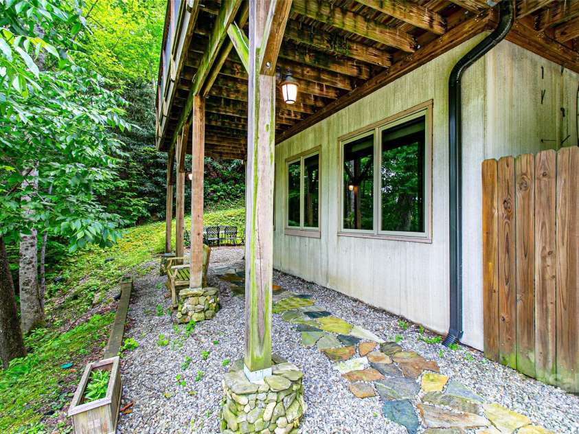 58 Great Aspen Way, Black Mountain, NC 28711.  MLS# CAR4256095, YatesRealty ID 17415. Stepping stones leading to the downstairs apartment.