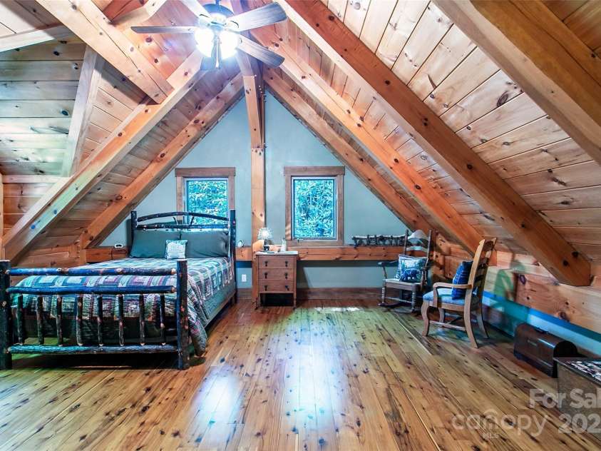 58 Great Aspen Way, Black Mountain, NC 28711.  MLS# CAR4256095, YatesRealty ID 17415. The ensuite loft bedroom is perfect for your family or guests. It also has a year-round mountain view.