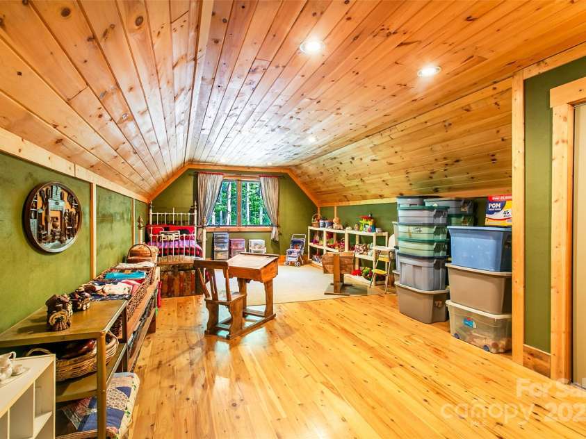 58 Great Aspen Way, Black Mountain, NC 28711.  MLS# CAR4256095, YatesRealty ID 17415. The large family room over the 2-car garage offers a multitude of possibilities!