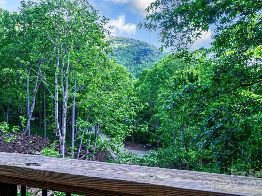 58 Great Aspen Way, Black Mountain, NC 28711.  MLS# CAR4256095, YatesRealty ID 17415. Year-round mountain view and multiple mountain winter views from this gorgeous timberframe home.