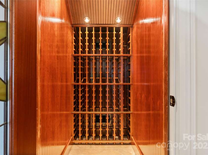 325 Ivy Arbor Circle, Rock Hill, SC 29732.  MLS# CAR4242278, YatesRealty ID 17417. Basement-Climate controlled wine cellar