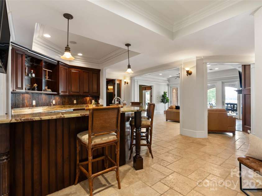 325 Ivy Arbor Circle, Rock Hill, SC 29732.  MLS# CAR4242278, YatesRealty ID 17417. Basement- Full bar with ice maker, mini fridges and dishwasher