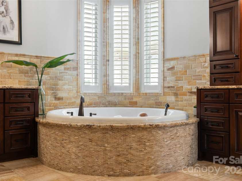 325 Ivy Arbor Circle, Rock Hill, SC 29732.  MLS# CAR4242278, YatesRealty ID 17417. Floor 1-Primary bathroom with marble finishes