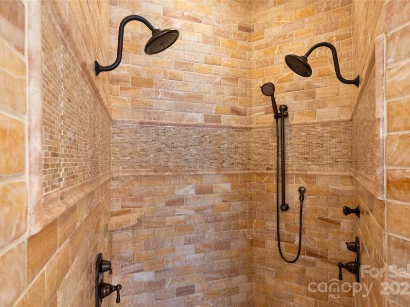 325 Ivy Arbor Circle, Rock Hill, SC 29732.  MLS# CAR4242278, YatesRealty ID 17417. Floor 1-Primary bathroom with marble finishes