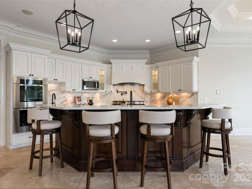 325 Ivy Arbor Circle, Rock Hill, SC 29732.  MLS# CAR4242278, YatesRealty ID 17417. Floor 1-Updated Kitchen with new quartz counters, painted cabinetry, lighting, hardware and faucets