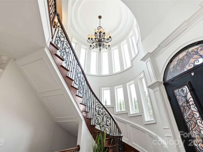 325 Ivy Arbor Circle, Rock Hill, SC 29732.  MLS# CAR4242278, YatesRealty ID 17417. SStunning spiral Stairwell at entryway