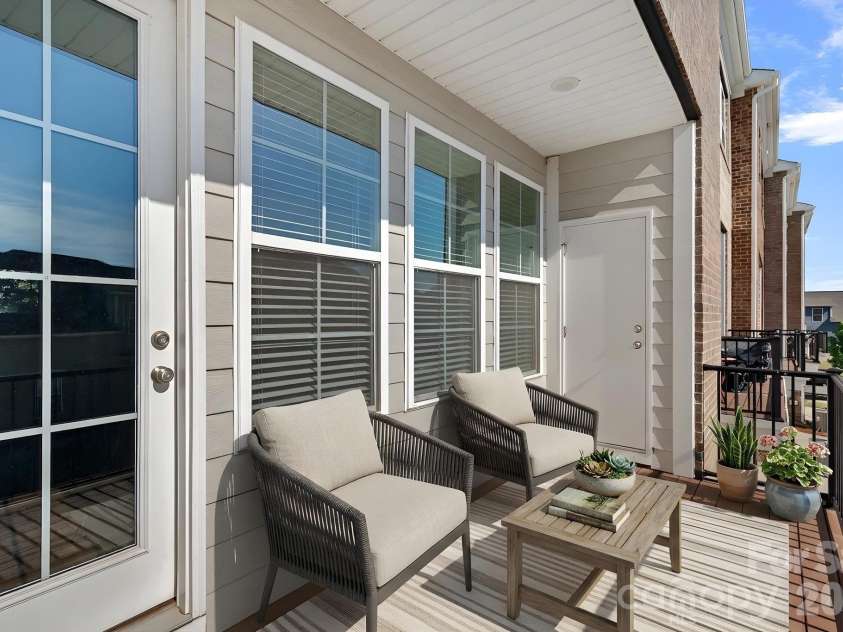 11523 Red Rust Lane, Charlotte, NC 28277.  MLS# CAR4376500, YatesRealty ID 17420. Balcony, off Great Roomm, virtually staged