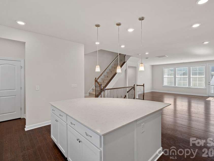 11523 Red Rust Lane, Charlotte, NC 28277.  MLS# CAR4376500, YatesRealty ID 17420. Convenient pantry and half-bath just off the kitchen.