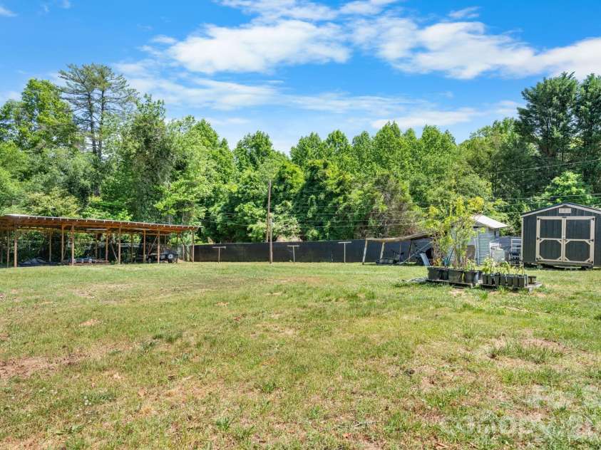 3706 2nd Avenue, Hickory, NC 28601.  MLS# CAR4374944, YatesRealty ID 17428. Back yard left corner