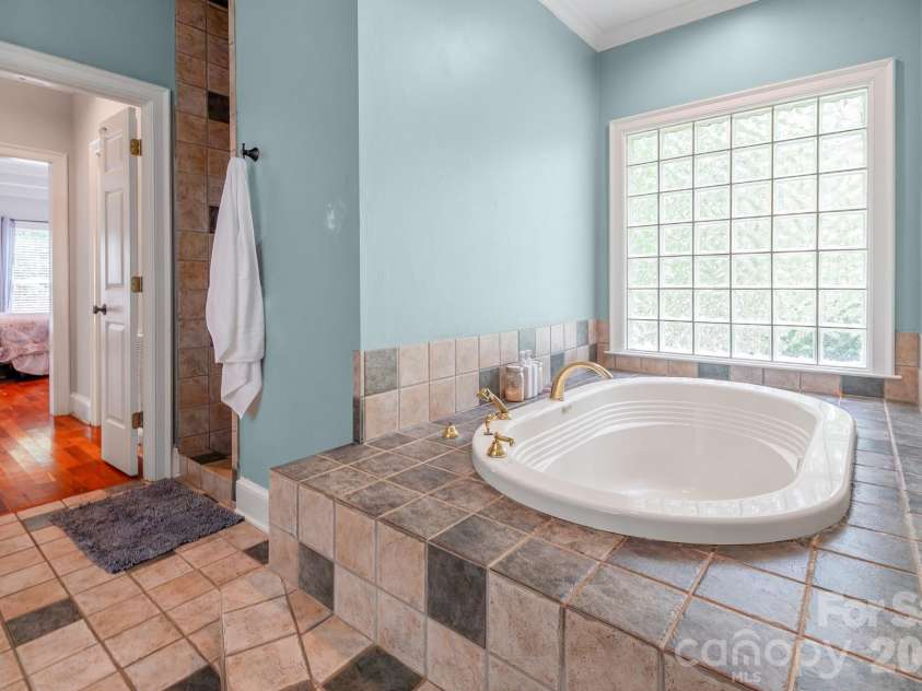 2008 Greenbrook Parkway, Weddington, NC 28104.  MLS# CAR4376393, YatesRealty ID 17429. Primary bath