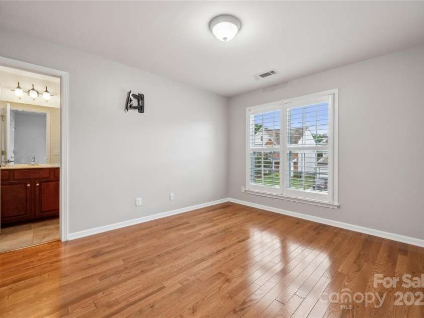 5046 Cressingham Drive, Fort Mill, SC 29707.  MLS# CAR4263729, YatesRealty ID 17429. Jr ensuite with hardwoods