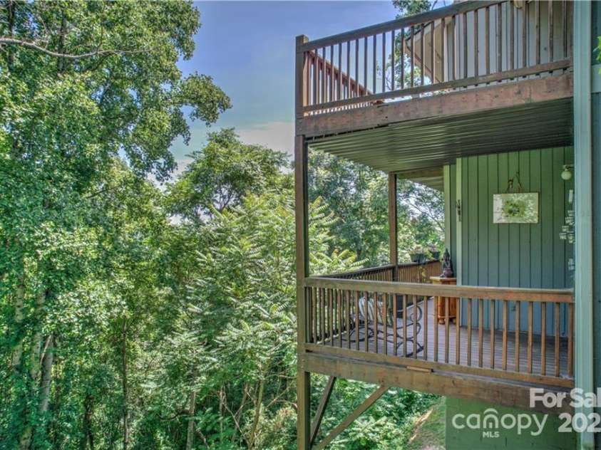 418 Windswept Drive, Asheville, NC 28801.  MLS# CAR4225274, YatesRealty ID 17433. Beautiful Covered Deck Space