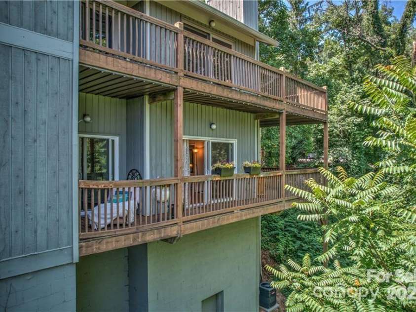 418 Windswept Drive, Asheville, NC 28801.  MLS# CAR4225274, YatesRealty ID 17433. Deck Runs the Whole Length of the Condo