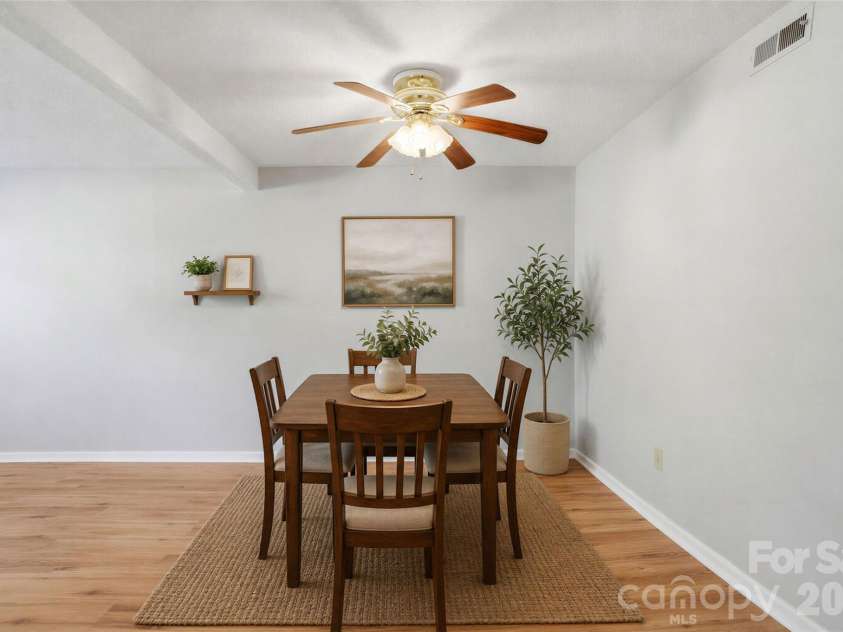8846 Hunter Ridge Drive, Charlotte, NC 28226.  MLS# CAR4376839, YatesRealty ID 17433. Virtually staged dining area - open concept 