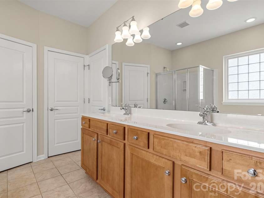 15164 Legend Oaks Court, Fort Mill, SC 29707.  MLS# CAR4375145, YatesRealty ID 17440. Primary Bath with dual sinks